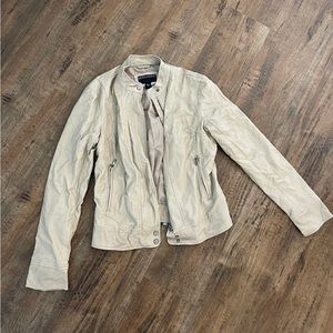 Medium light leather jacket. Size medium. Normal wear